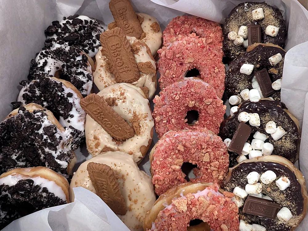 Premium donuts topped with Oreo, Biscoff, strawberry crunch and s'mores